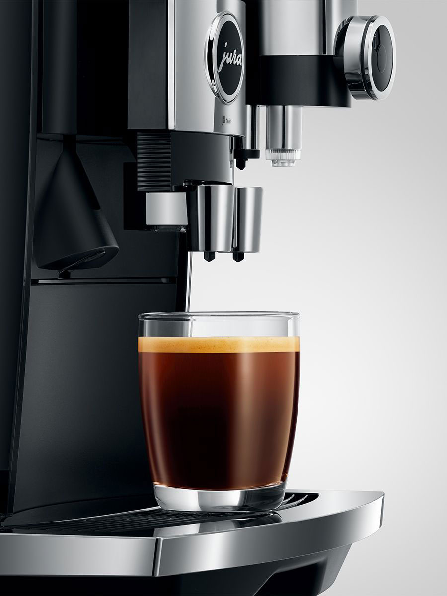 Coffee and Espresso Machine Pouring Coffee