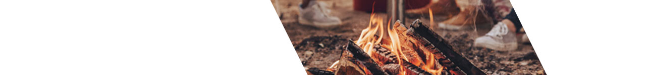 Bonfire with people around it