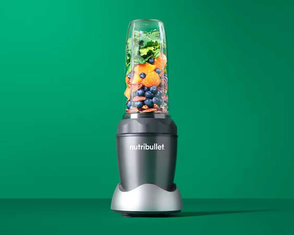 Fruit Inside a Gray NutriBullet Pro 1000 Personal Blender Before Blending
