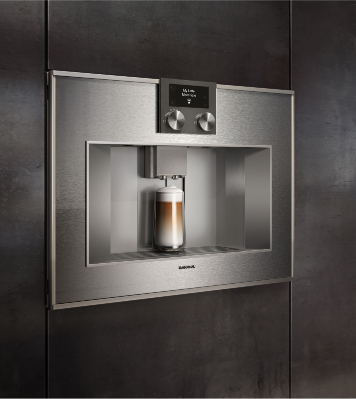 A Gaggenau built-in coffee machine positioned in a well-designed kitchen, emphasizing its modern aesthetics and practical use