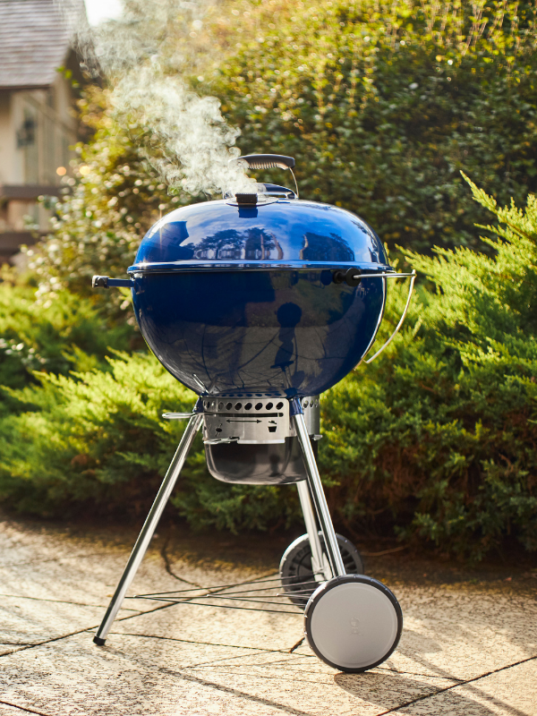 A tight shot on a black Weber Charcoal Grill