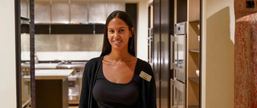 kalee laborde standing in a designer kitchen in the Abt inspiration studio