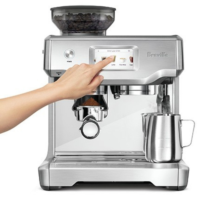 Imae of Person Using Espresso Machine