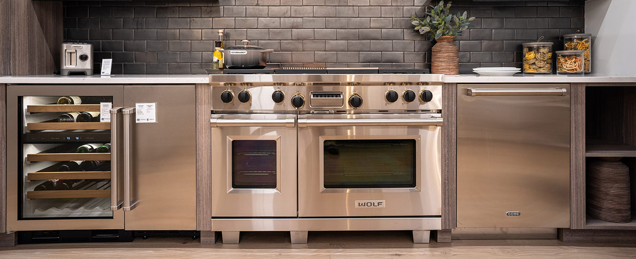Close-up of a Wolf Range in The Living Kitchen featuring Sub-Zero, Wolf and Cove Appliances