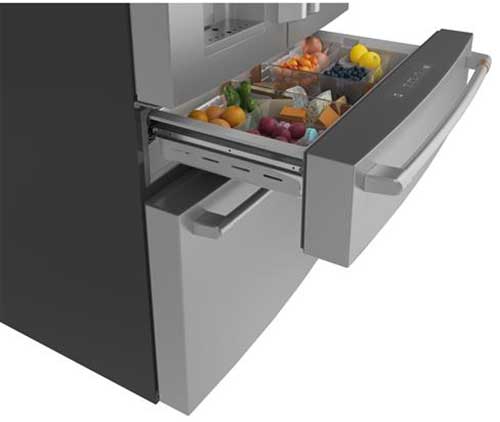 Angle view of pulled-out convertible drawer with food inside.