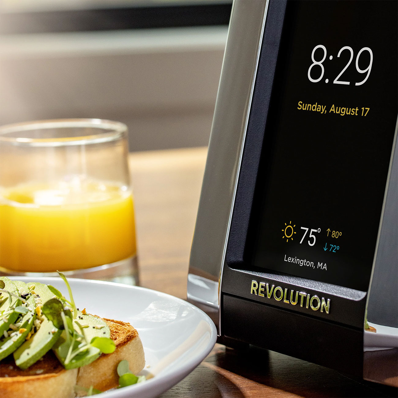 Closeup Front View of Revolution Cooking Toaster on Table Next to Toast
