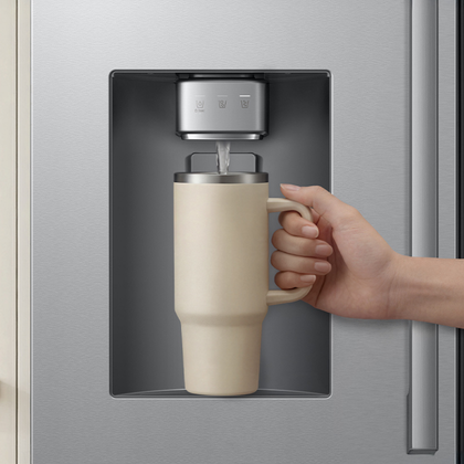 Tall water and ice dispenser filling large bottle