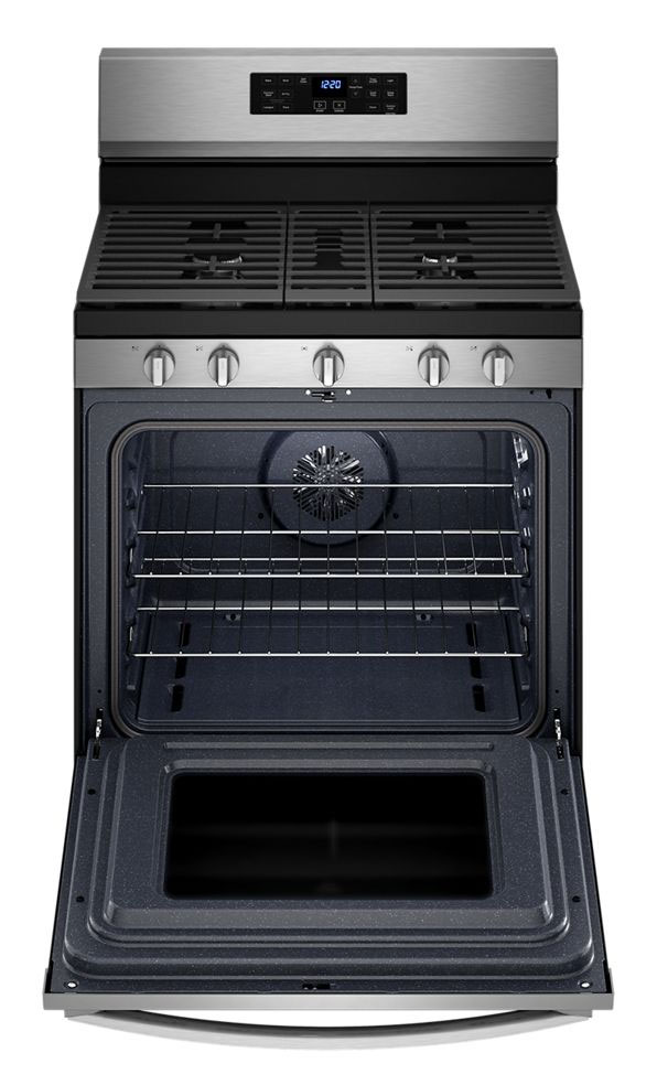 Gas range with oven open and racks only