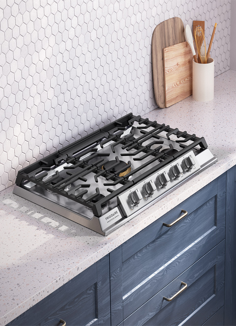 A person opens a Wolf warming drawer, placing a freshly baked pie inside