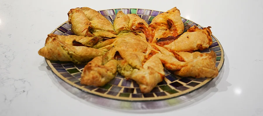 A puff pastry wreath appetizer dish
