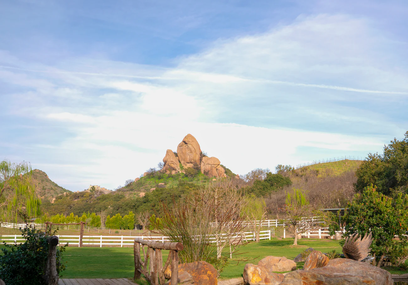 Expansive ranch outdoor living space with landscape audio