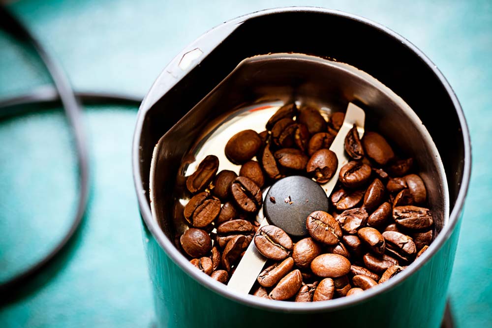 Coffee grinder with whole coffee beans