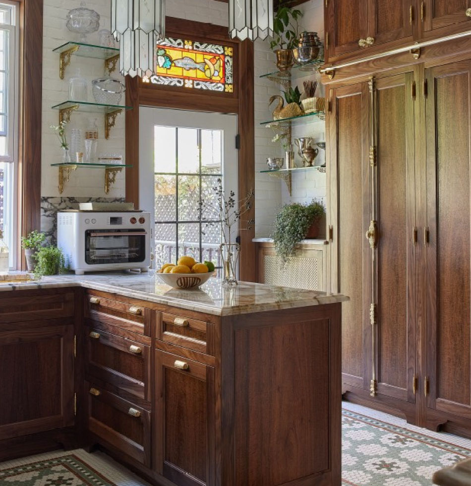 after photo of kitchen space for crystals kitchen redesign shocasing the wooden cabinets, cafe countertop air fryer and other aesthetic features