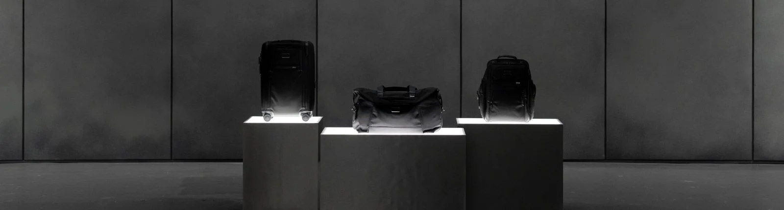 Stylized photo of 3 tumi bags