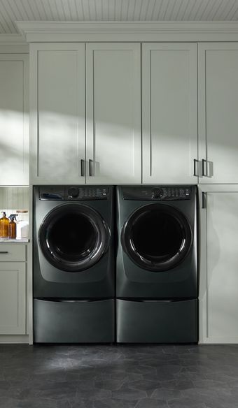 Alpine Green Electrolux Laundry pair in a laundry room setting