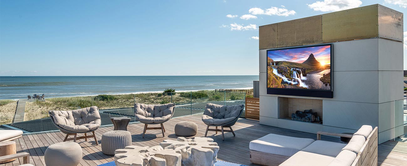 Seura outdoor TV on a beachside patio