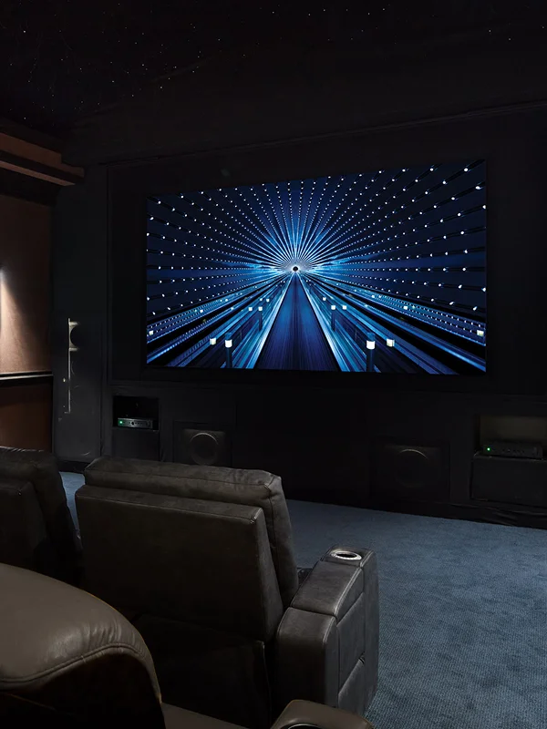 Custom high‑end audio system with amplifiers and speakers in a stylish listening room