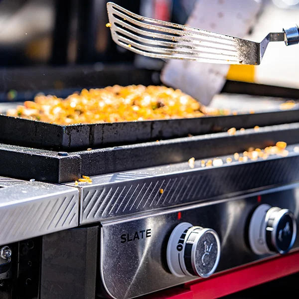 closeup of Weber Slate griddle with rice on top