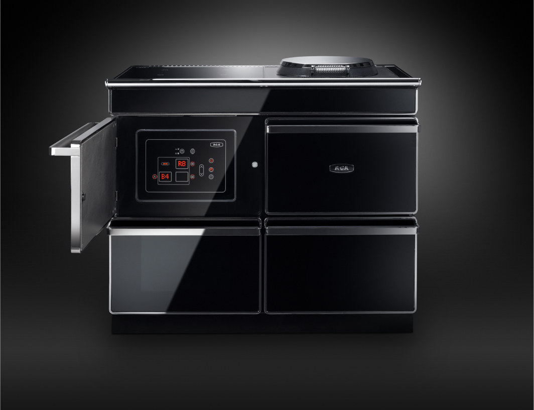 AGA kitchen with contemporary island and wall-mounted pot filler