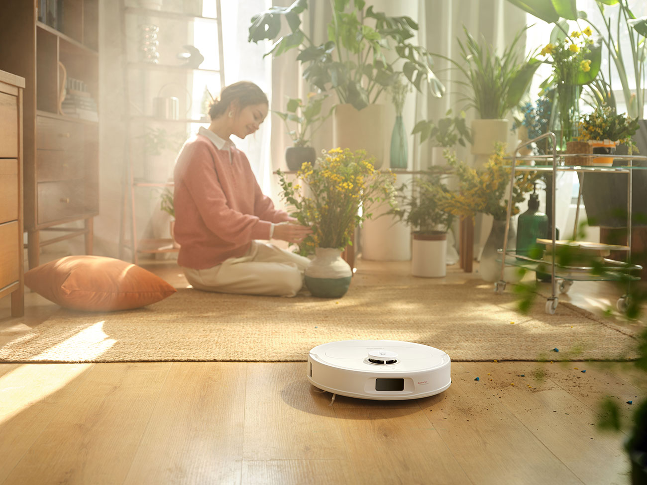 Lifestyle image of Roborock Robot Vacuum cleaning dirt