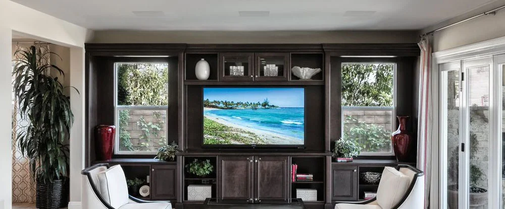 In-Ceiling speakers installed over a home entertainment system