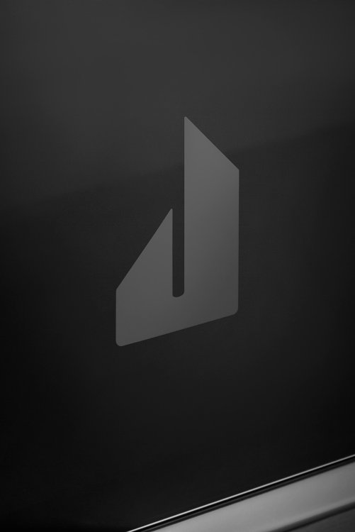 Large image of JennAir NOIR 48 In. Floating Glass Black And Stainless Steel Gas Professional-Style Range With Chrome-Infused Griddle And Grill