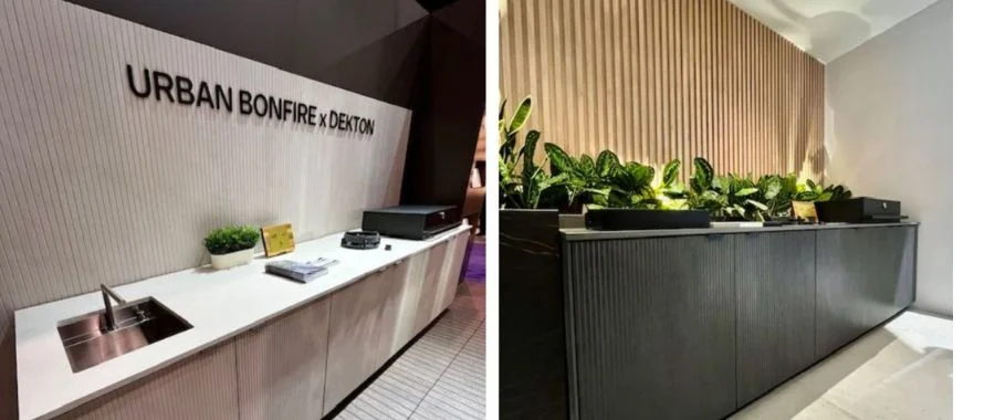 The Urban Bonfire booth at KBIS 2024, with two outdoor kitchen models. One is beige and one is black