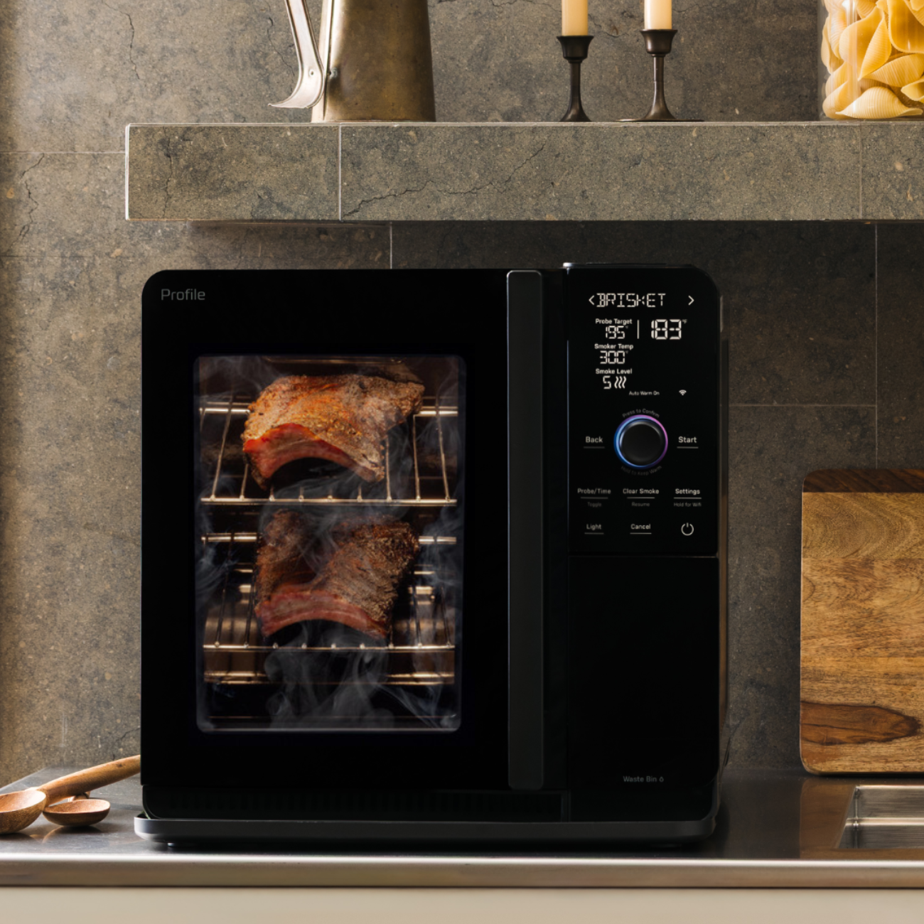 Lifestyle image of the GE Profile Smoker in a kitchen setting