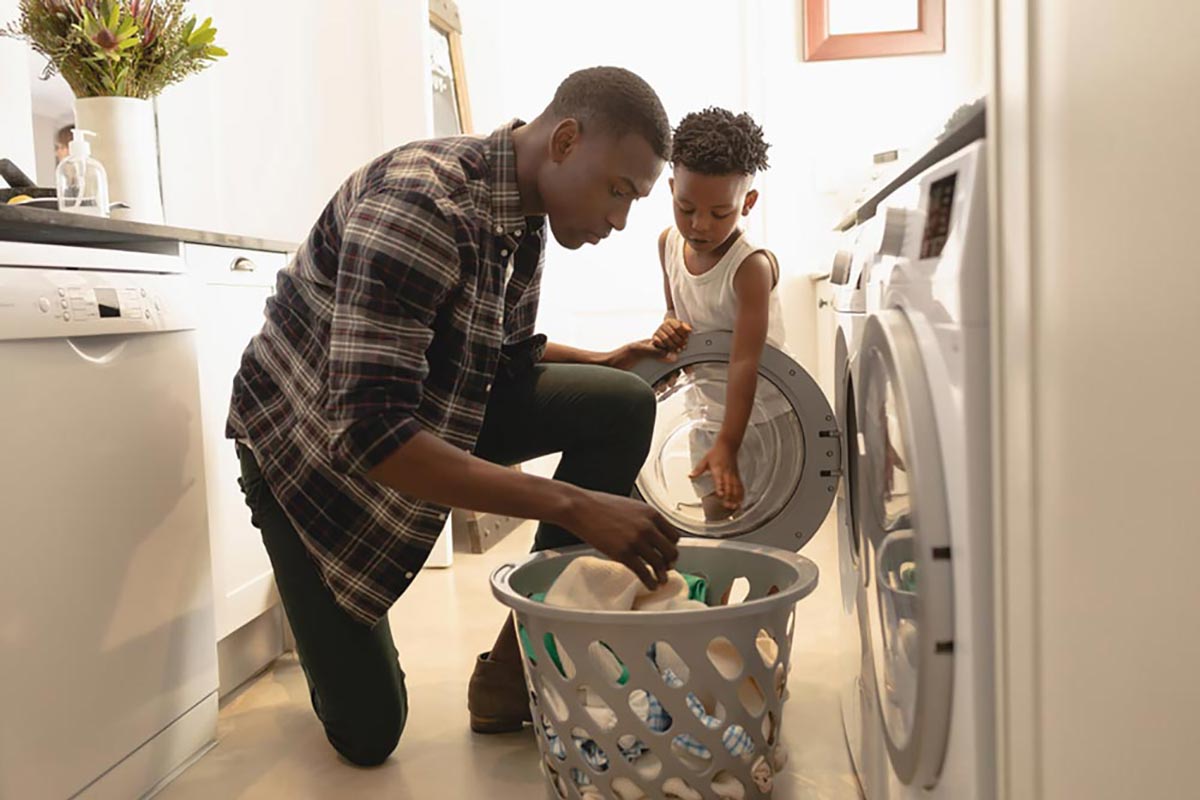 Father and Son doing Laundry