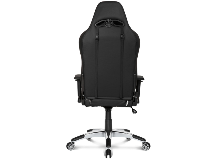 Back view of black and white AKRACING chair with headrest cushion and five-star wheeled base.