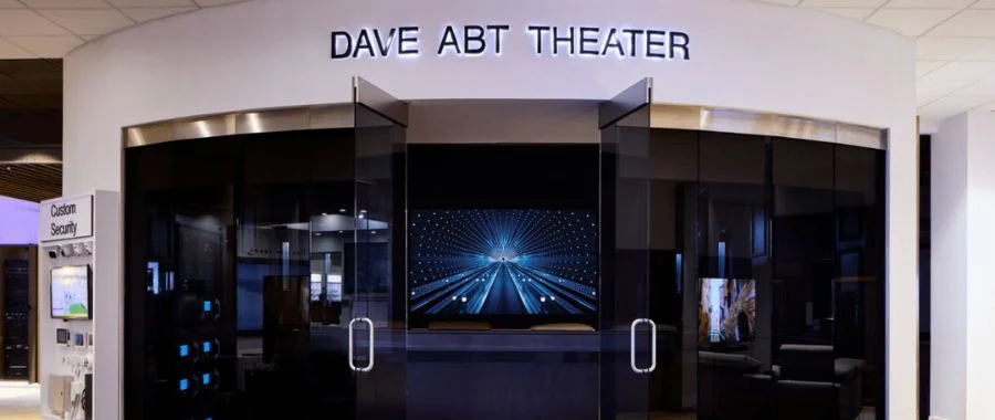 The Dave Abt Theater Viewed from the outside. Viewers can see the Samsung The Wall screen as well as the comfortable home theater seating