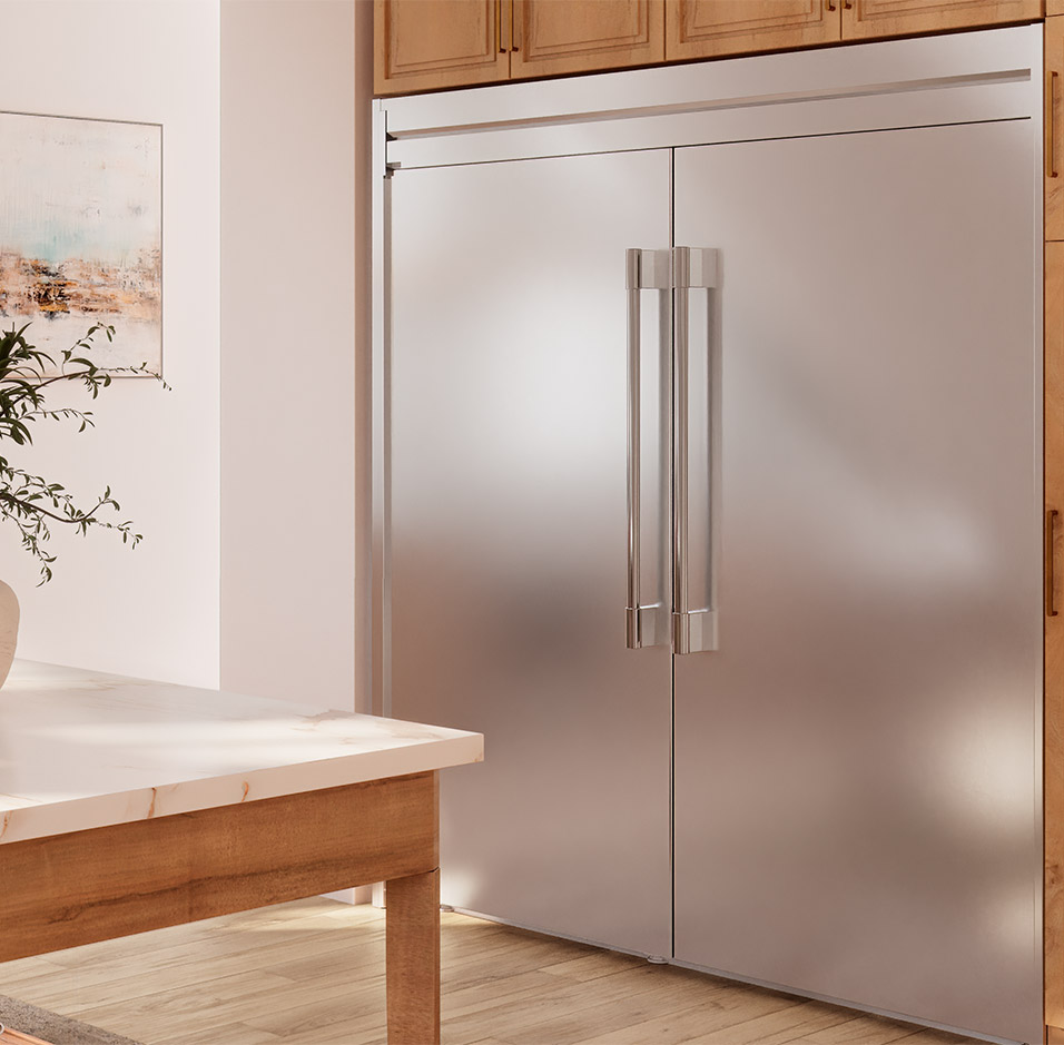Modern kitchen setting with a close up on the Frigidaire Professional built in refrigerator