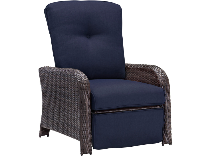 A navy blue reclining chair with wicker frame
