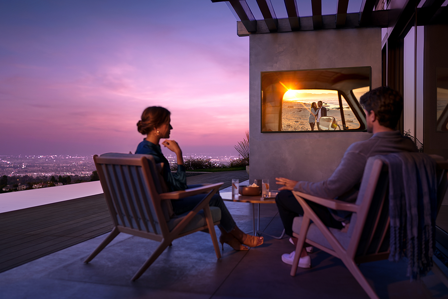 Lifestyle image of Samsung The Terrace Black QLED 4K UHD Outdoor Smart HDTV