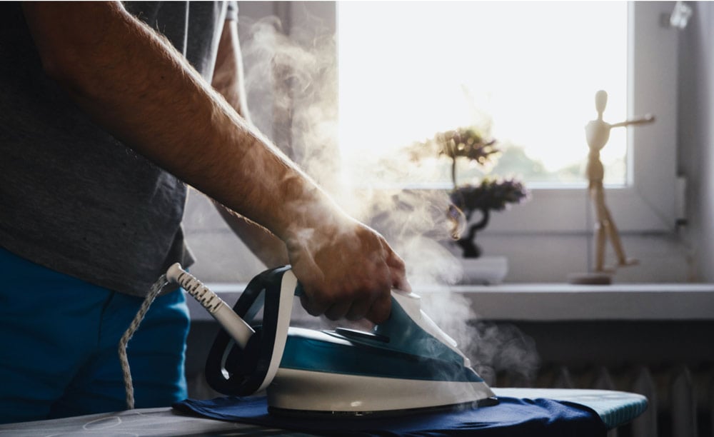 Man Ironing Clothes