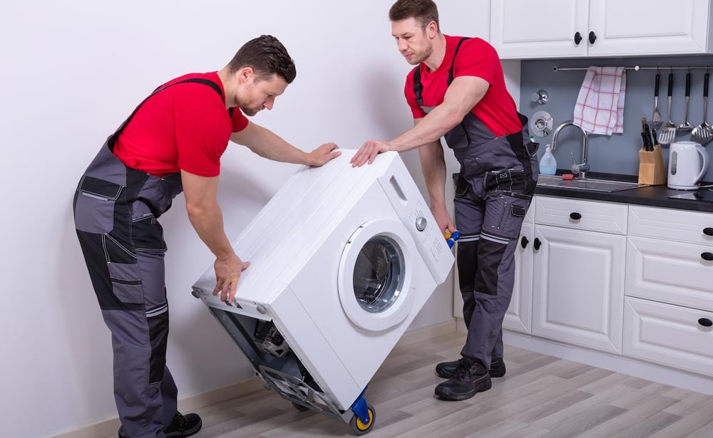 movers moving washing machine