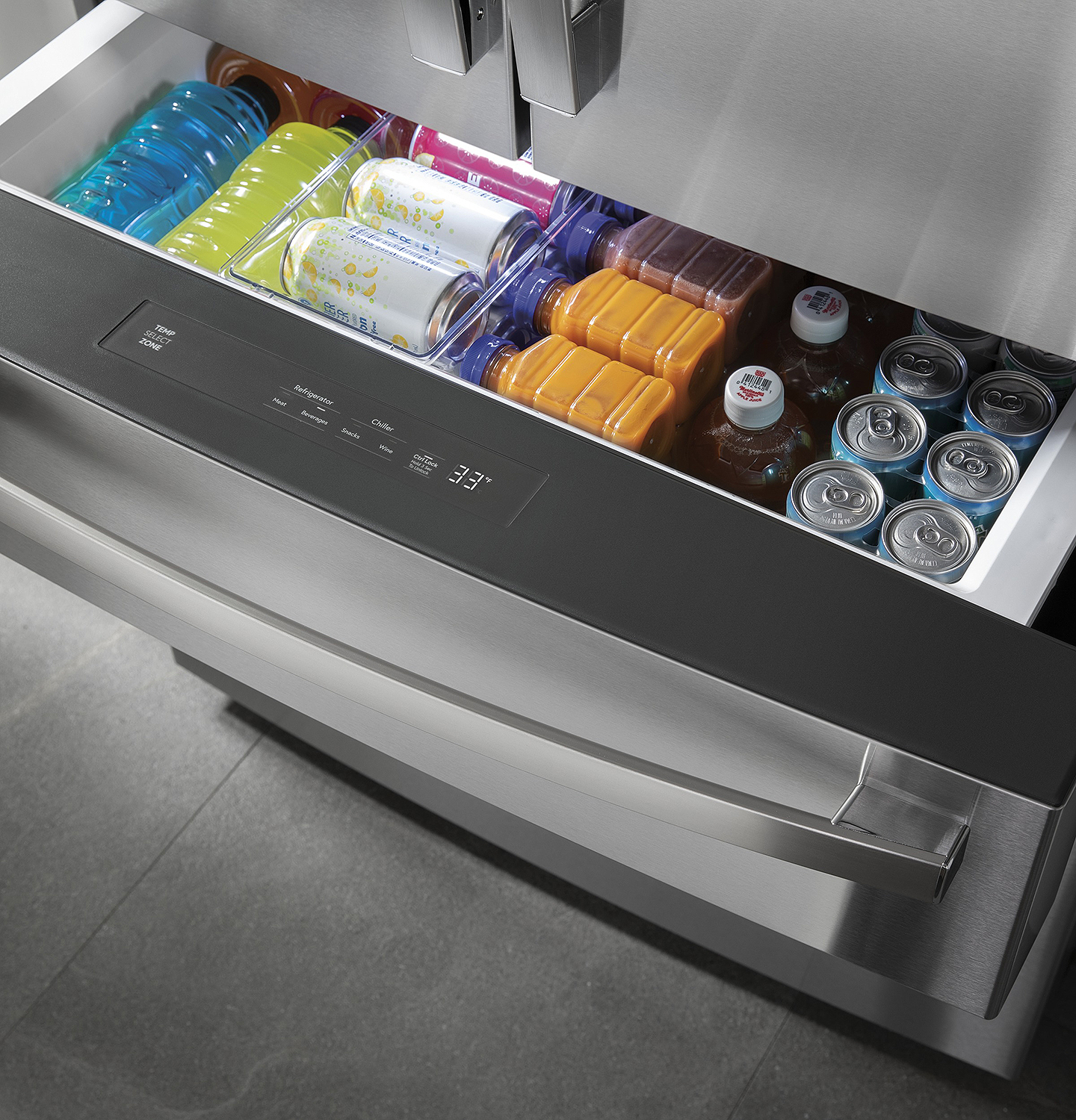 Variety of drinks in freezer drawer.