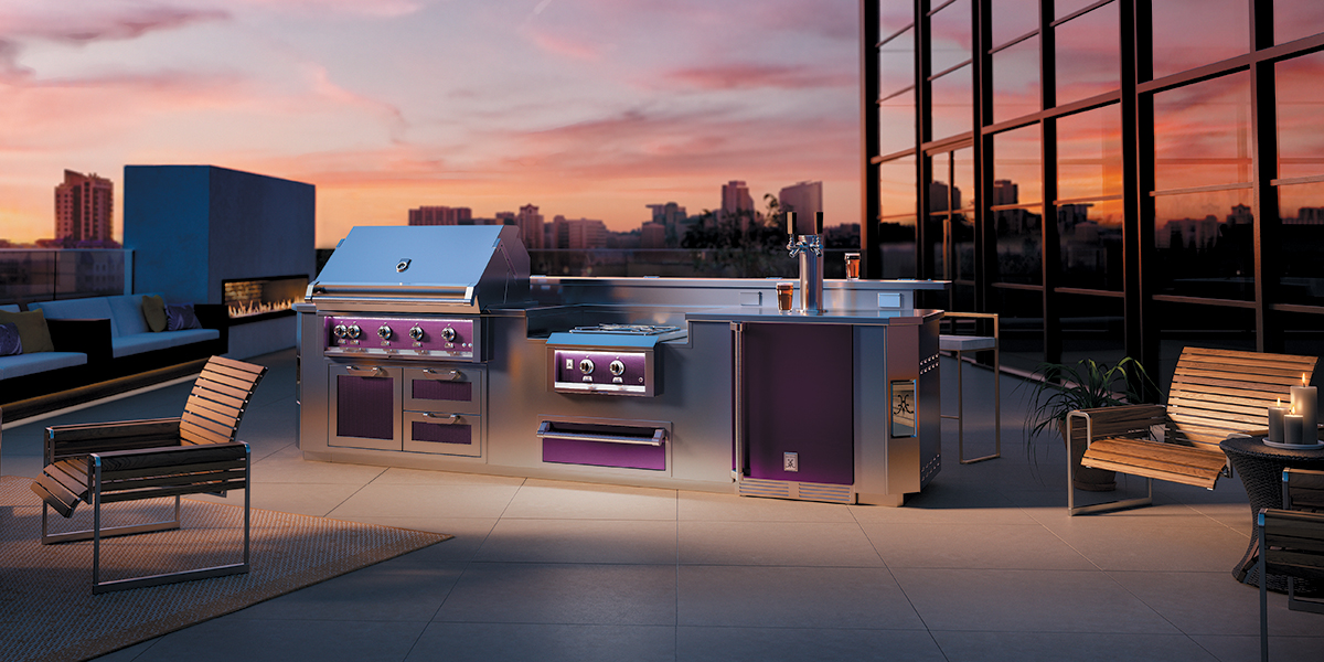 An outdoor rooftop kitchen with purple accents, featuring a kegerator