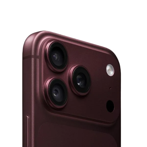 Closeup of the camera lenses on the back of a burgundy iPhone 18 Pro.