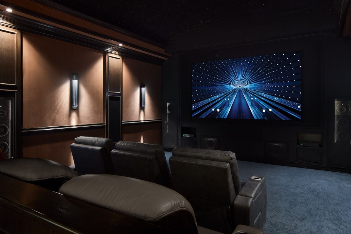 Abt close up of speakers and TV in custom cabinet