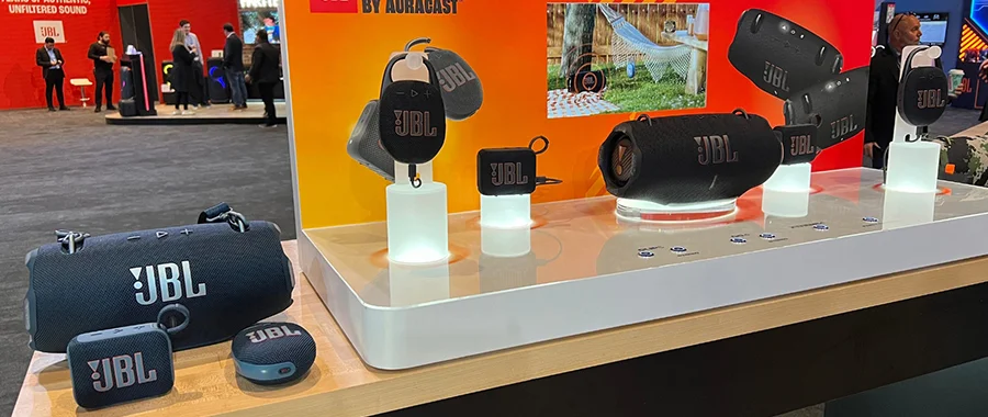 Multiple JBL speakers sitting next to each other on display at CES 2024