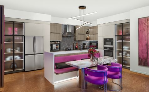 Wide shot of a moden kitchen with purple and pink accents and all ge profile appliances
