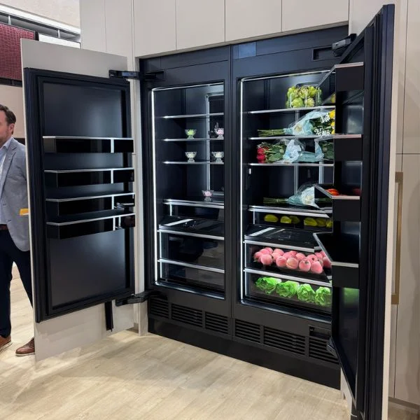 Wide view of JennAir Obsidian refrigerator interior.