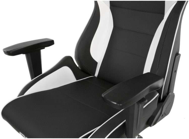 Side view of black and white gaming chair with adjustable armrests and base, showing profile and dimensions.