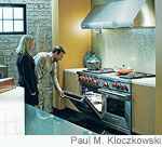 Customer shops with sales person at Abt - Photo Credit: Paul M. Kloczkowski