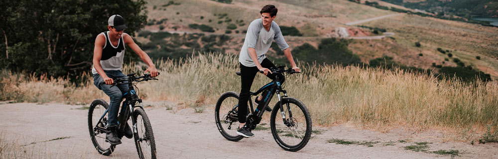 Two people on Electric Bikese