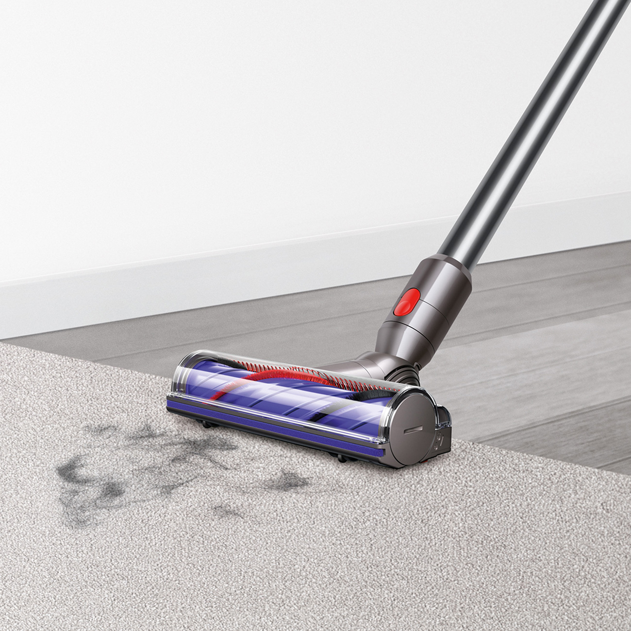 Dyson V8 Cordless Stick Vacuum Used to Clean Pet Hair off Carpet and Tile

