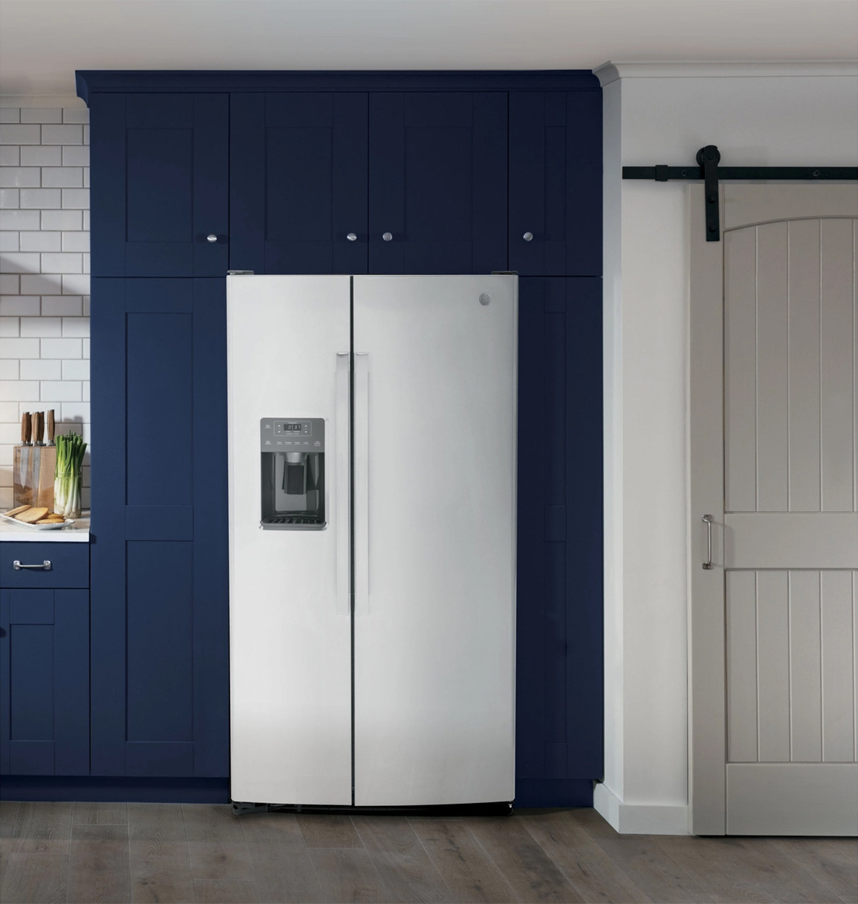 Front view of refrigerator installed in kitchen
