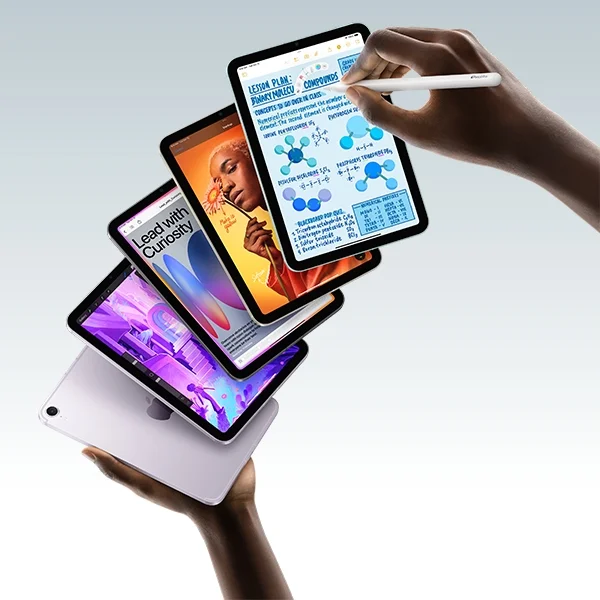 An image of five different ipad minis being shuffled like cards or floating through space. An Apple pencil is being used to write on one
