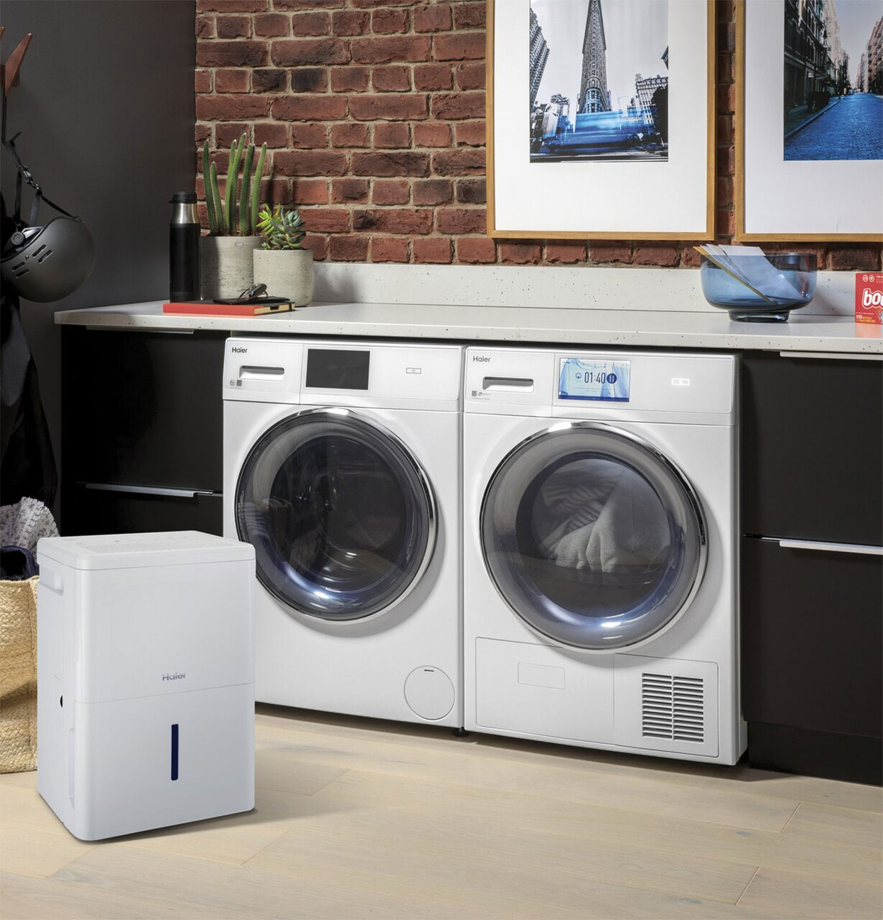 White Haier 50 Pint Dehumidifier in a Laundry Room 